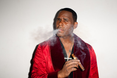 R. Kelly smoking a cigarette (or weed)
