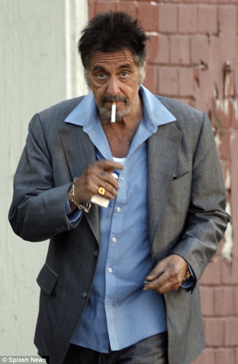 Al Pacino smoking a cigarette (or weed)
