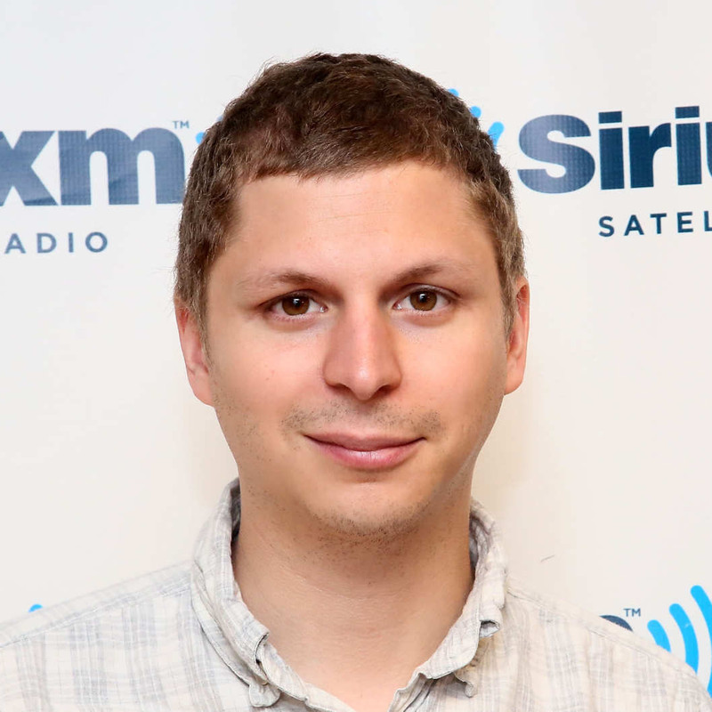 Michael Cera  - 2024 Light brown hair & Caesar hair style.
