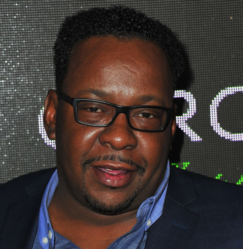 Bobby Brown 2024 noire cheveux & afro style de cheveux.
