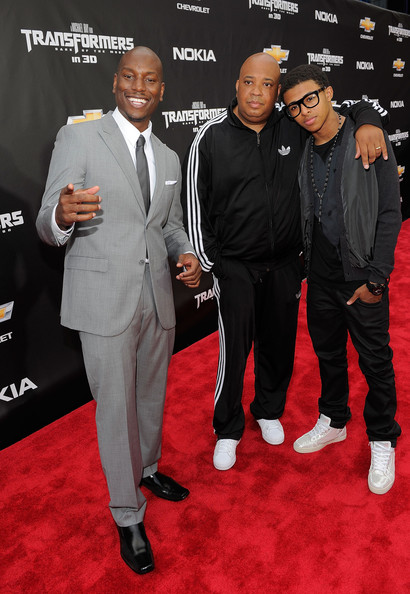 Foto von Rev Run  & sein  Sohn  Diggy Simmons 