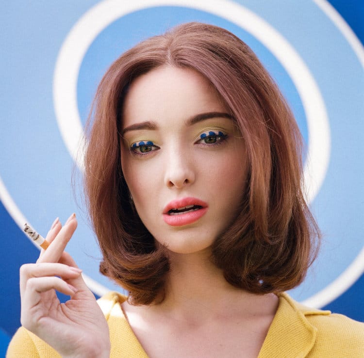 Emma Dumont smoking a cigarette (or weed)
