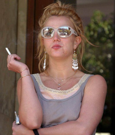 Britney Spears smoking a cigarette (or weed)
