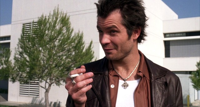 Timothy Olyphant smoking a cigarette (or weed)
