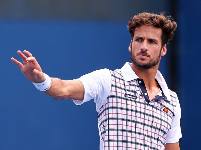 Feliciano López 2024 brun foncé cheveux & Énervé style de cheveux.
