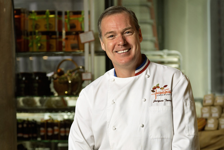 Jacques Torres  - 2024 Light brown hair & dressy hair style.
