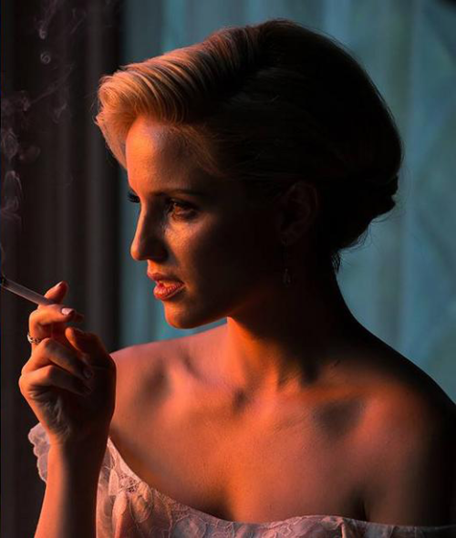 Dianna Agron smoking a cigarette (or weed)
