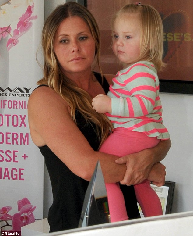 Photo of Nicole Eggert  & her  Dilyn Herwick