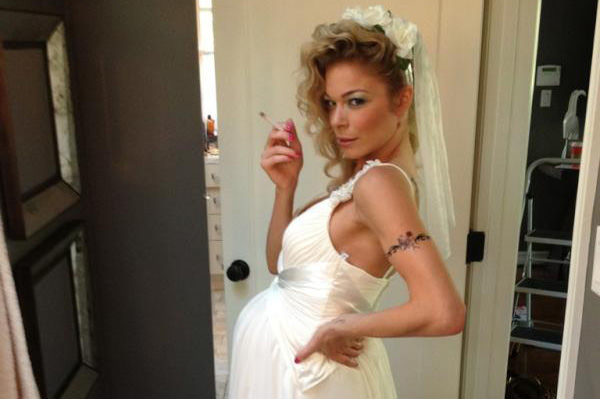 LeAnn Rimes smoking a cigarette (or weed)
