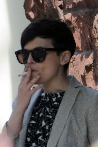 Ginnifer Goodwin smoking a cigarette (or weed)
