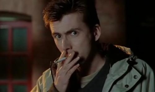 David Tennant smoking a cigarette (or weed)
