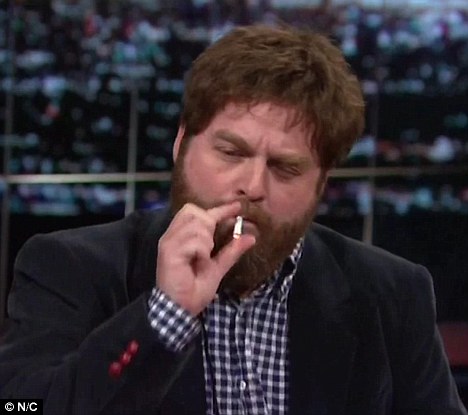 Zach Galifianakis smoking a cigarette (or weed)
