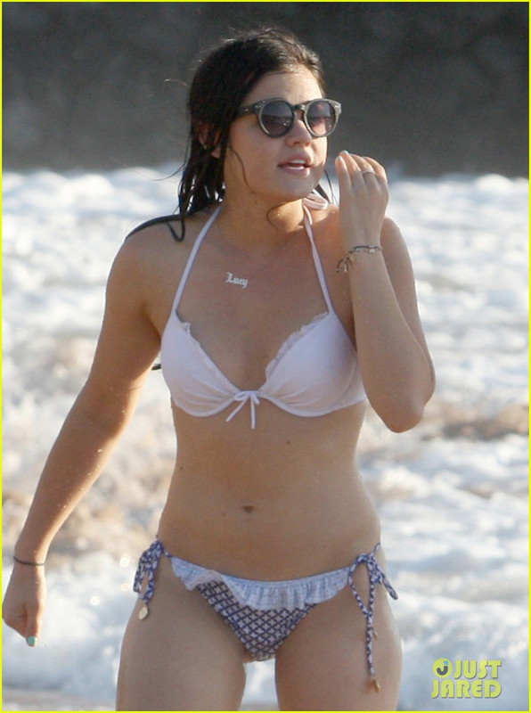 With her slim body and Dark brown hairtype without bra (cup size 30B) on the beach in bikini
