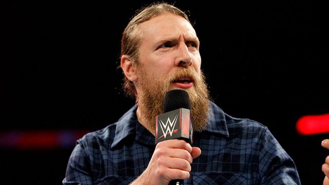 Daniel Bryan  - 2024 Light brown hair & classic hair style.
