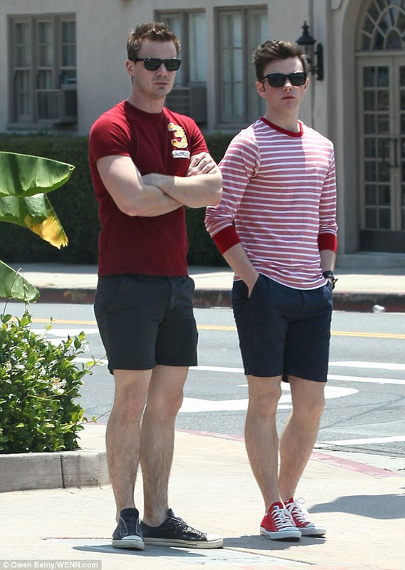 The Gemini with shirtless slim body on the beach
