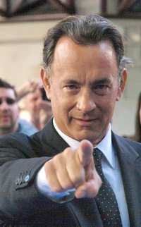 Tom Hanks  - 2024 Dark brown hair & formal hair style.
