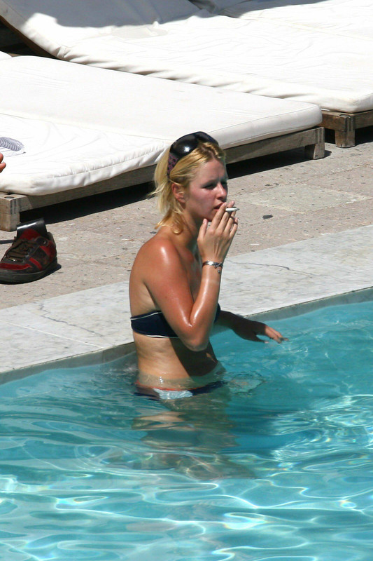 Nicky Hilton smoking a cigarette (or weed)
