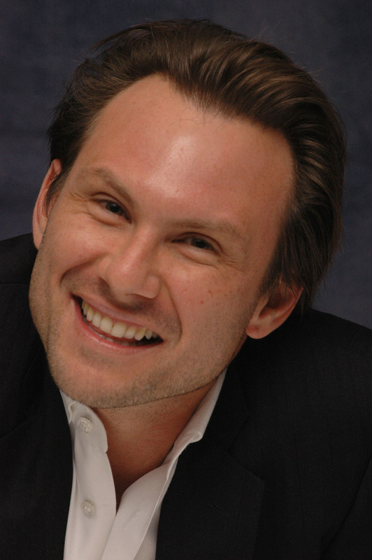 Christian Slater  - 2024 Regular brown hair & chic hair style.
