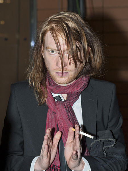 Domhnall Gleeson smoking a cigarette (or weed)
