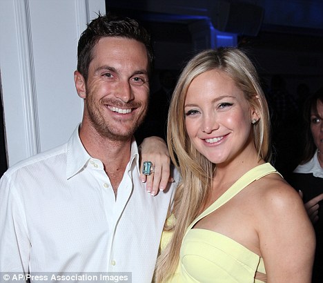 Foto von Kate Hudson  & irh Bruder  Oliver Hudson