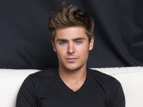 Zac Efron 2024 brun clair cheveux & Bohème style de cheveux.
