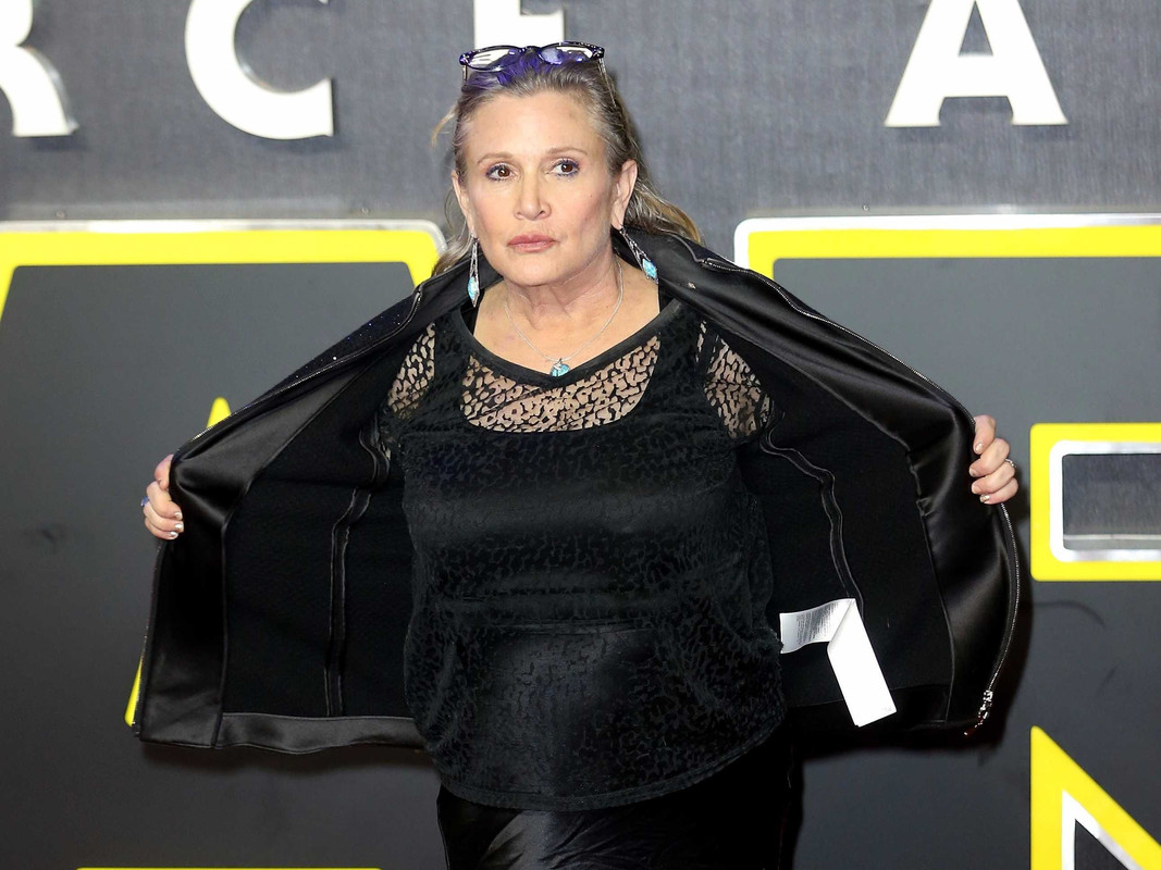 Carrie Fisher  - 2024 Dark brown hair & alternative hair style.
