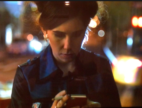 Zosia Mamet smoking a cigarette (or weed)
