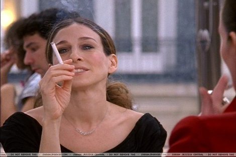 Sarah Jessica Parker smoking a cigarette (or weed)
