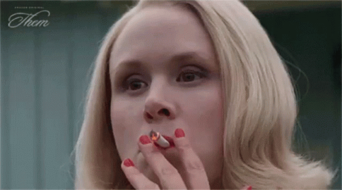 Alison Pill smoking a cigarette (or weed)
