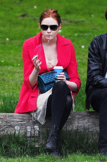 Karen Gillan smoking a cigarette (or weed)
