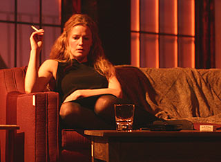 Elisabeth Shue smoking a cigarette (or weed)
