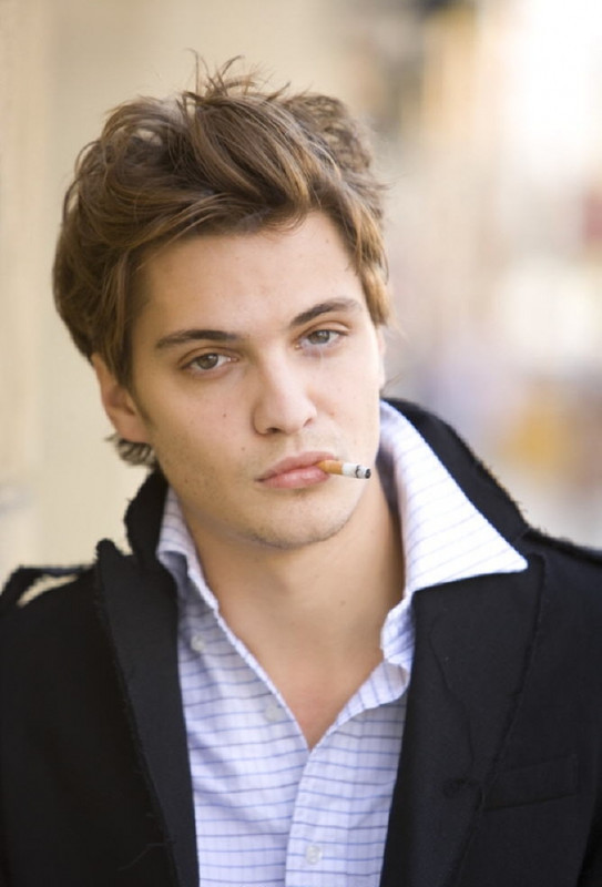Luke Grimes smoking a cigarette (or weed)
