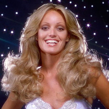 Susan Anton s 2024 Medel blond hår & dressy hårstil.
