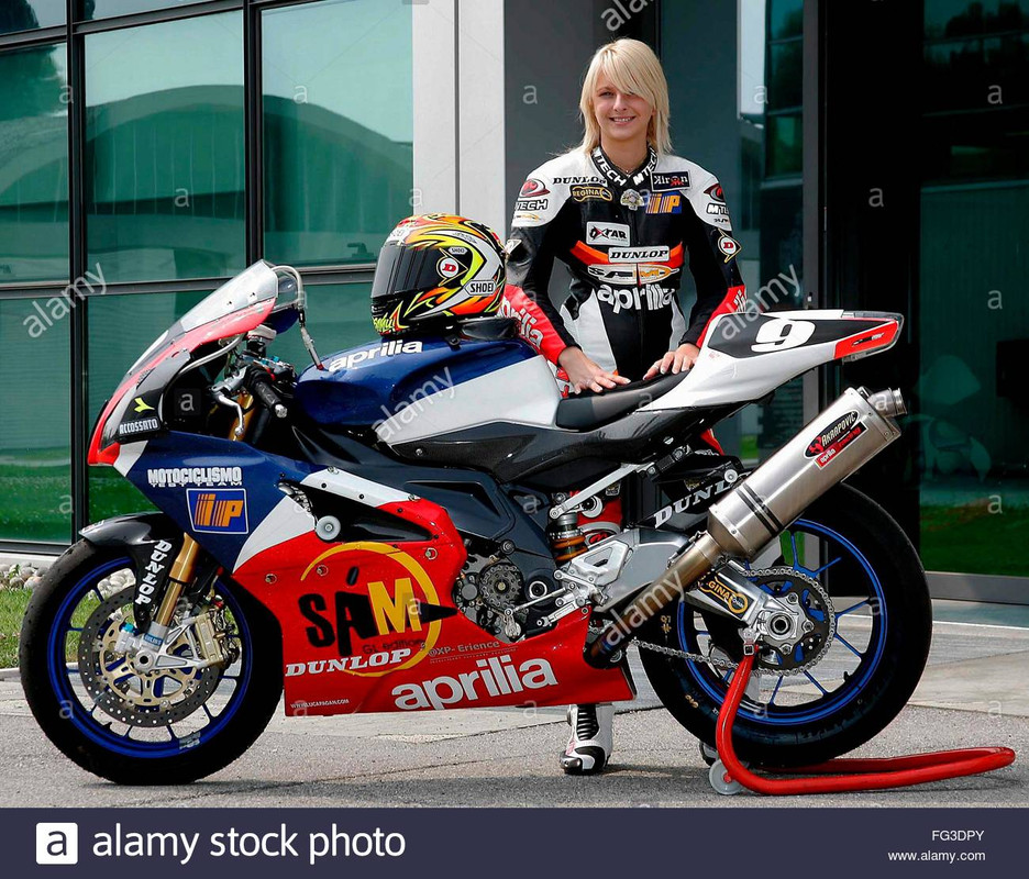 italian-samuela-de-nardi-poses-next-to-a-aprilia-rsv-1000-in-rome-FG3DPY