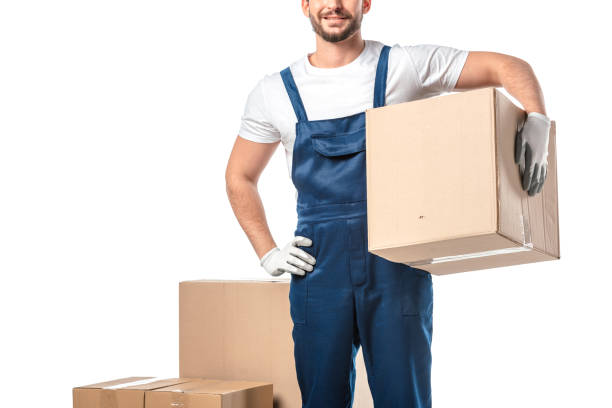Professional mover lifting boxes carefully