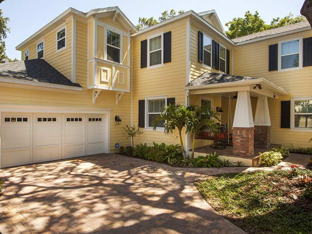 Craftsman style home with insulated siding