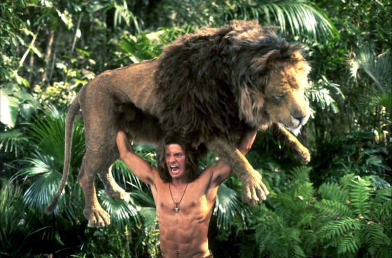 [Image: George-of-the-Jungle-lifting-a-Lion.png]