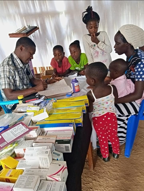 Healthcare workers operating in temporary field conditions
