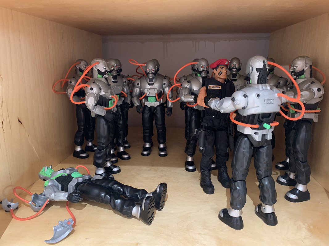 Action Man vs 14 silver robots. 920-DC43-A-3-A8-D-41-BD-BD04-ED17138-ECDAC