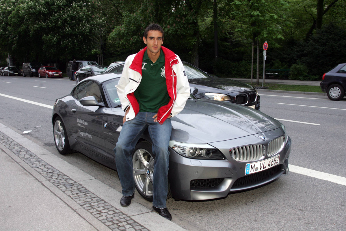 Marin with his BMW Z4 car