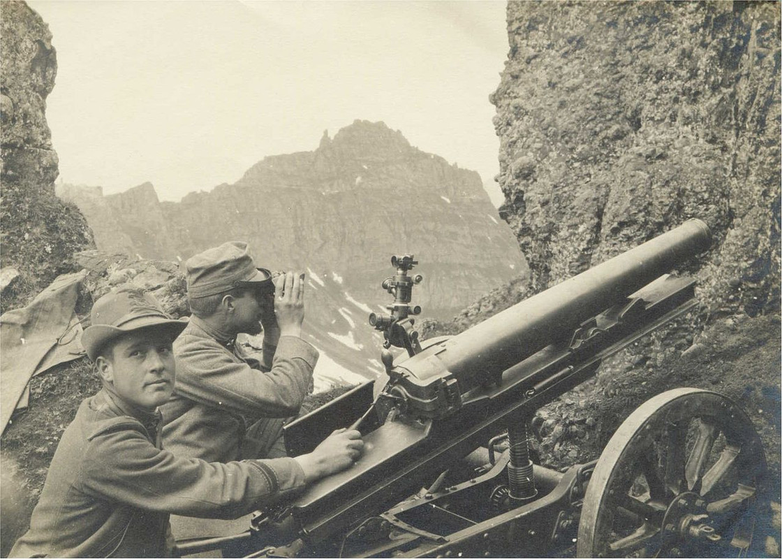 WWI-Monte-Padon-Italian-65-17-modello-13-mountain-howitzer-firing-at-Austrian-positions-on-the-S