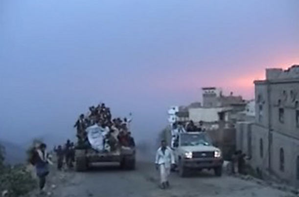 Rebels-ride-a-captured-tank-through-Saada-province-In-July-2009.jpg