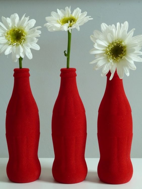 redpaintedflowwercokebottles.jpg