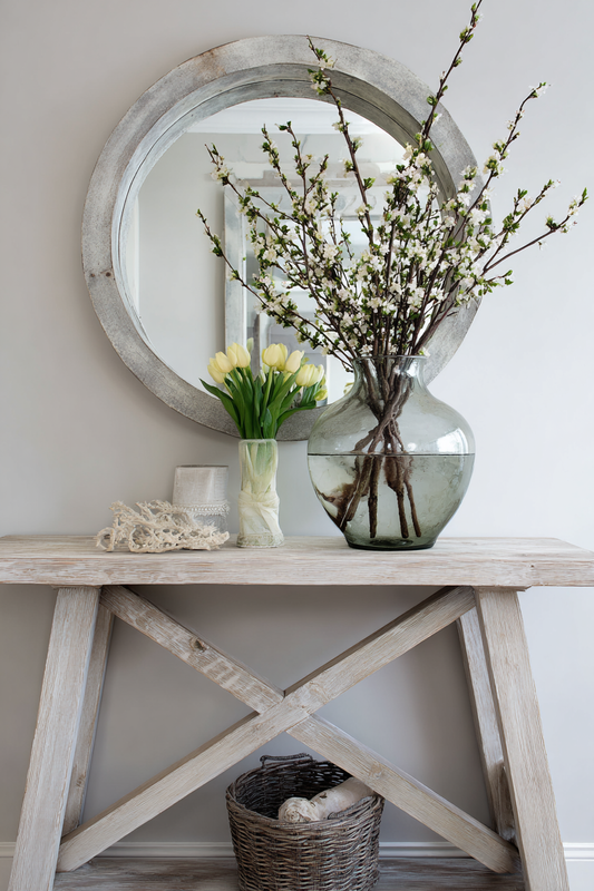 Light wood console table with round mirror above fresh spring 8ba91805 8768 486e a1a7 a3c4a7bf9e31 0