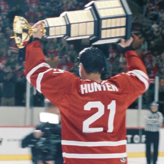 scott hunter lifting the stanley cup, photographed from behind