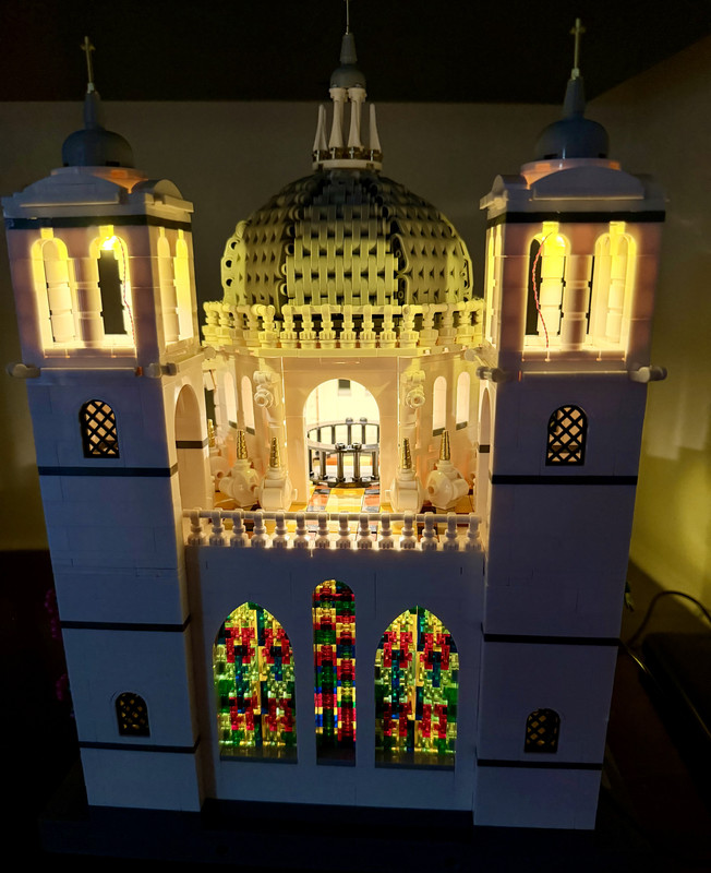 The rear of the church — one of my favorite angles, especially with the stained-glass windows lit from inside.