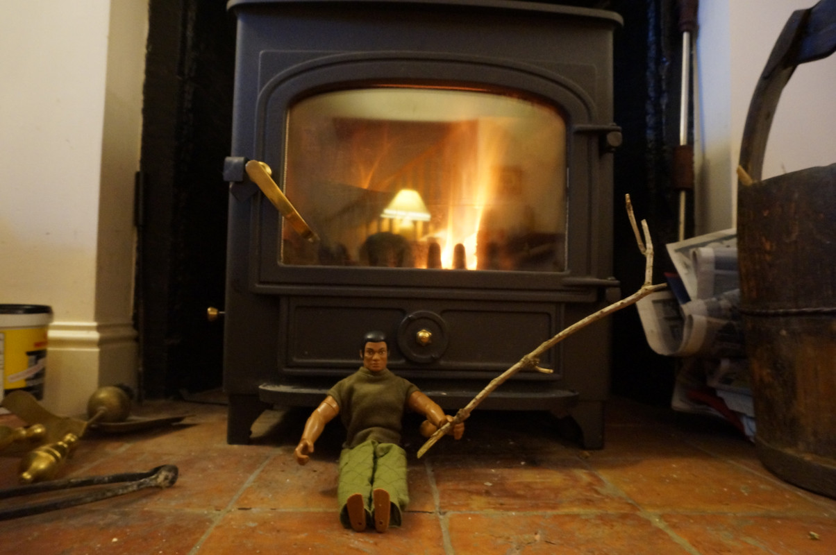 Joe relaxes in front of the Fire Stove and doing other relaxing things. E1-FBDAB5-C5-E2-4-BB3-B9-A6-7-AD48-C313-CFC