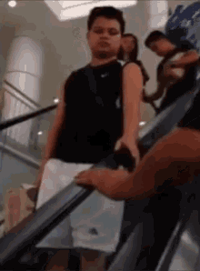 escalator-handshake.gif