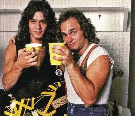 mike-and-eddie-having-a-drink-backstage-in-1979-v0-yymtgnmridjd1