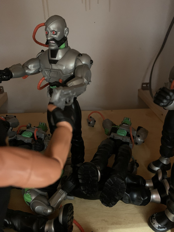 Action Man vs 14 silver robots. 80-FA88-B3-70-C1-40-EA-8-F41-D9302-B7941-C8